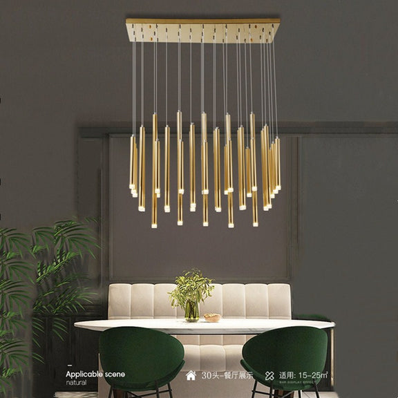 Gold cylinder pendant light cluster close-up
