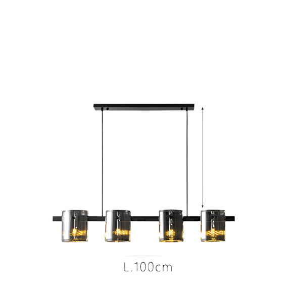 Minimalist linear pendant light featuring six cylindrical glass globes.