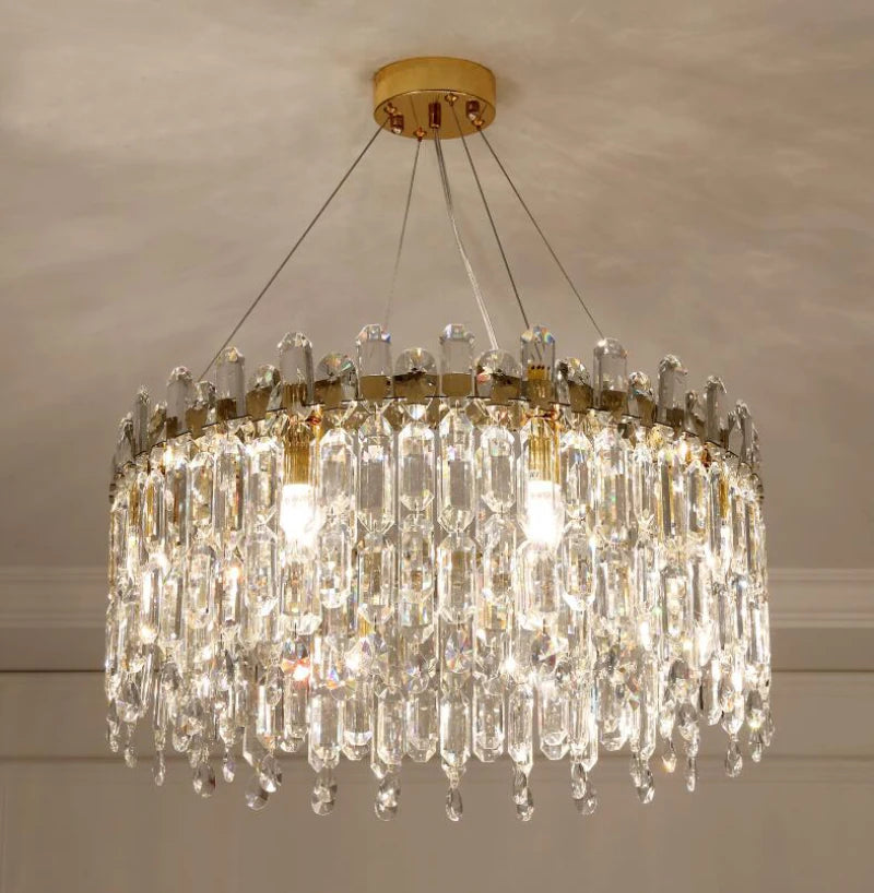 Side angle view of polished gold crystal ceiling light