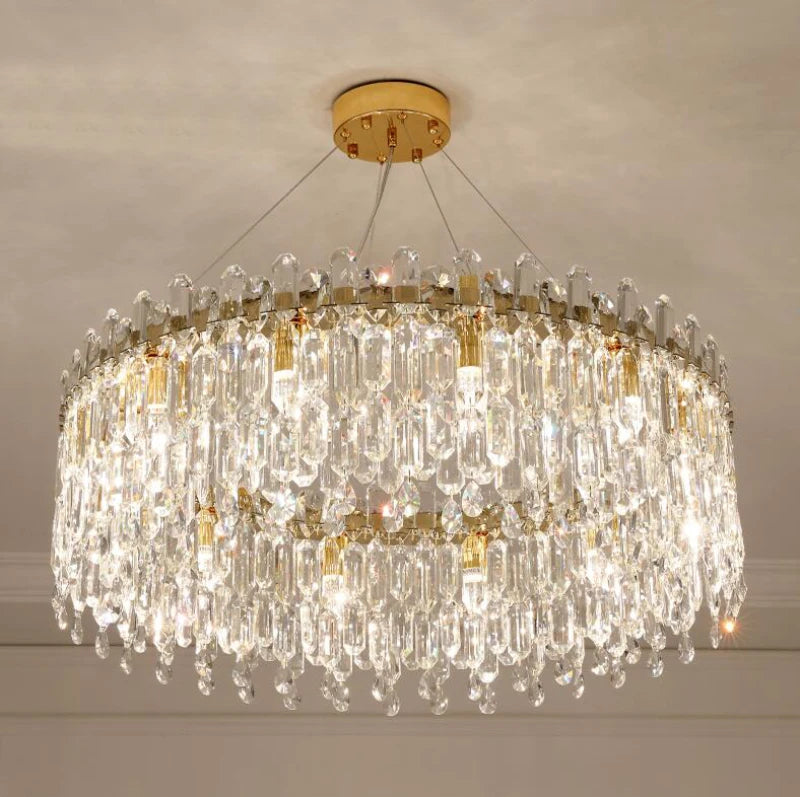 Modern crystal chandelier illuminated in warm LED light