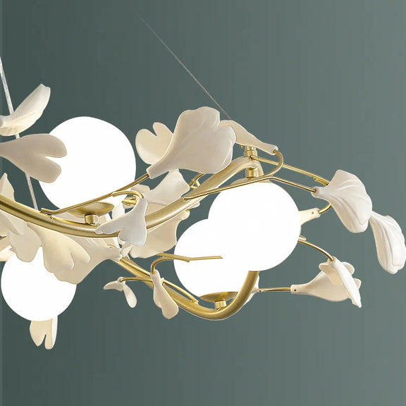 Contemporary dining room pendant light with decorative leaf elements