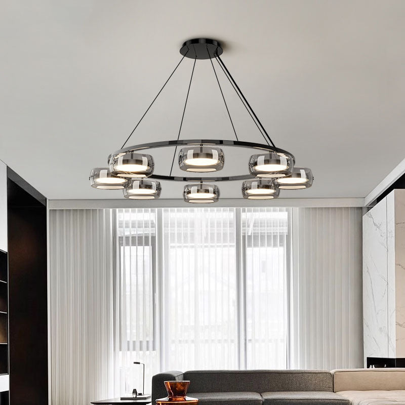 Close-up of circular LED chandelier pods and chrome frame