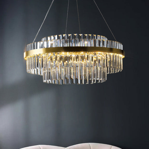 Modern gold crystal chandelier in living room setting