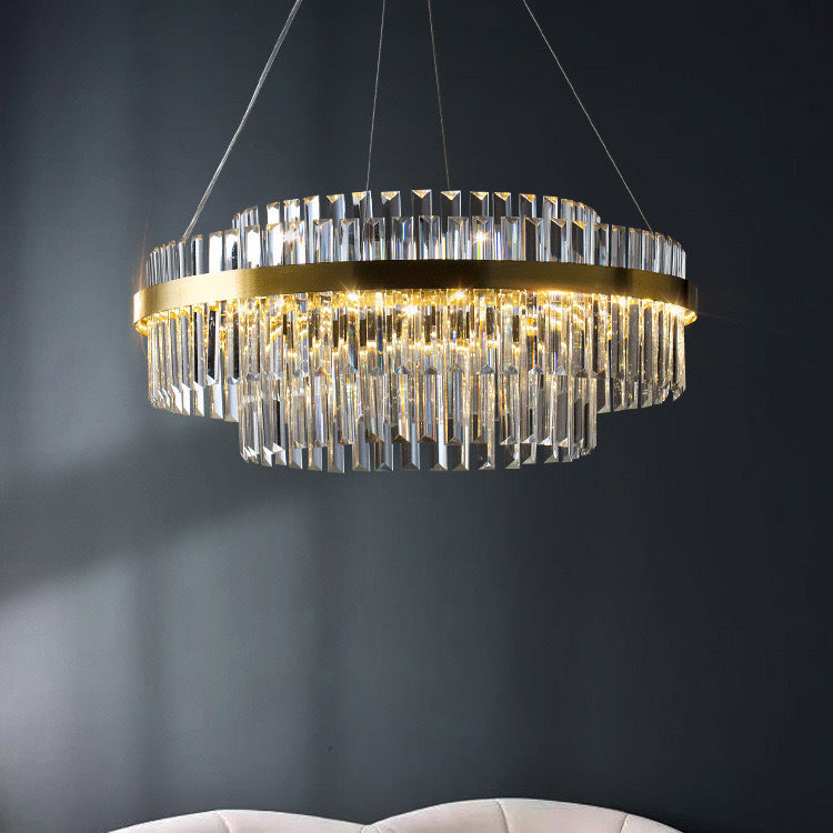 Modern gold crystal chandelier in living room setting