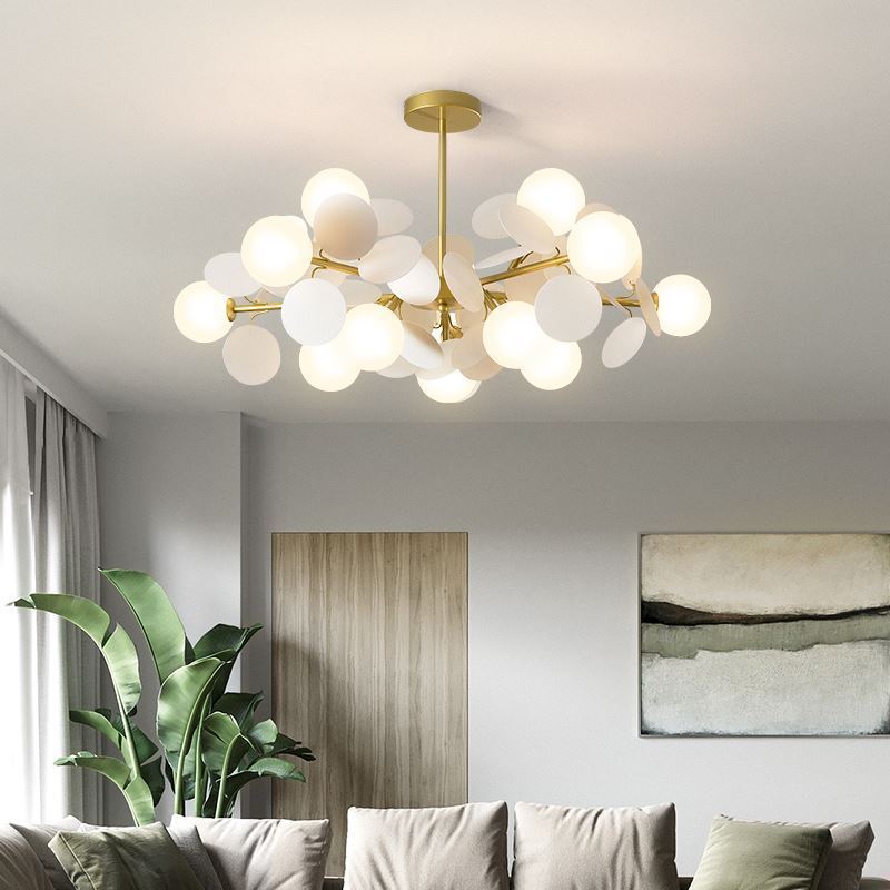 Modern globe leaf chandelier with pastel glass shades and gold frame