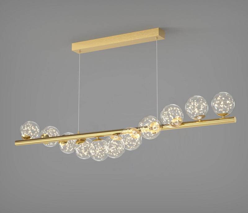 Gold linear chandelier with crystal glass globes