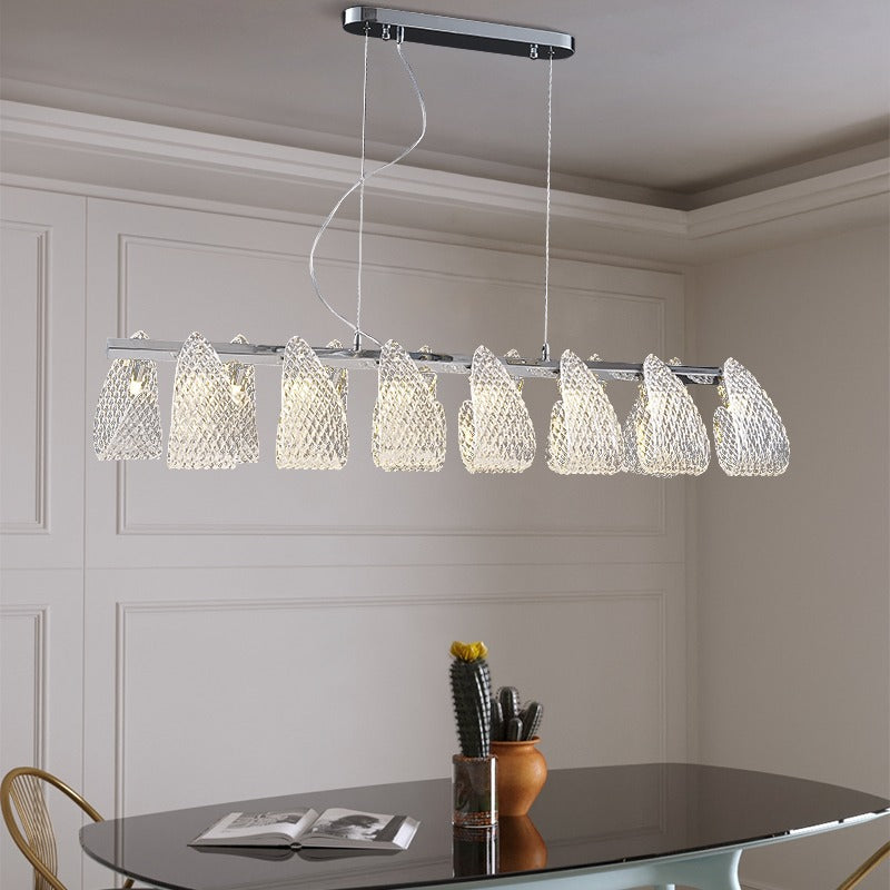Textured glass ribbon chandelier illuminated by LED bulbs