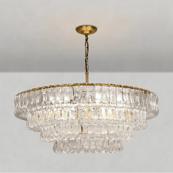 Clear glass tiered pendant light with sculpted form