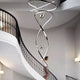 Designer staircase LED pendant twisted spiral form