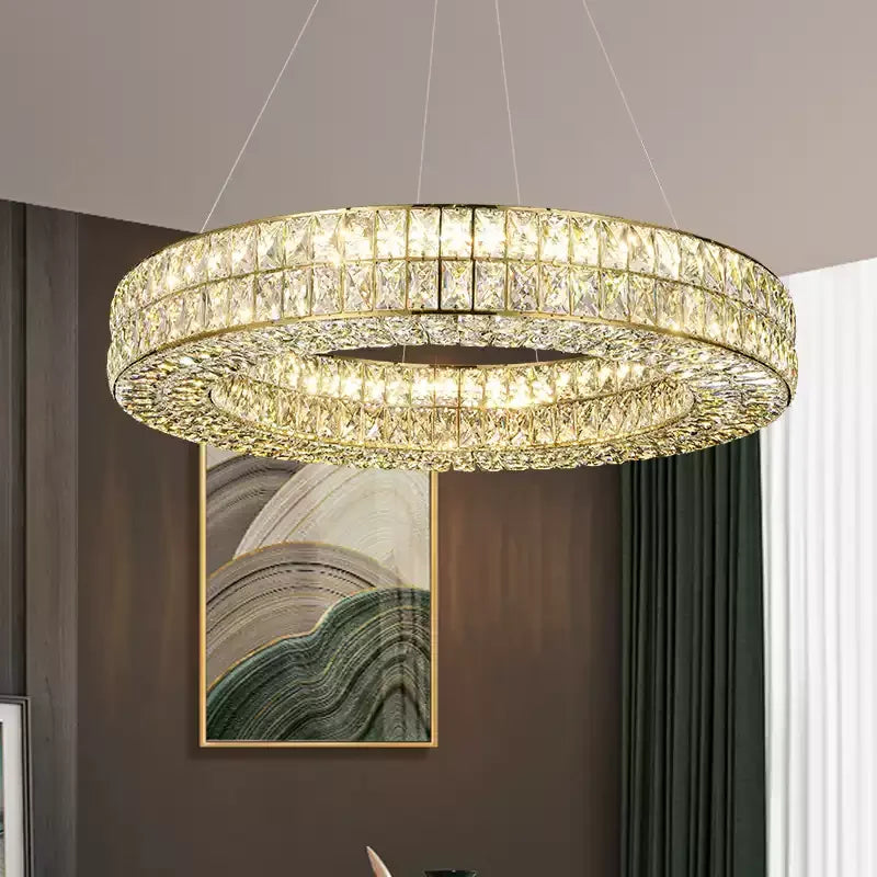 Hanging suspension cable detail on modern crystal chandelier.