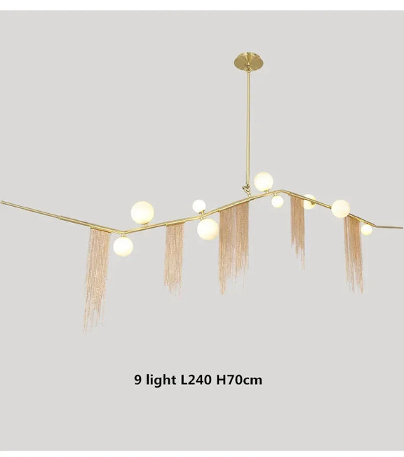 Gold G9 glass globe tassel chandelier hotel lobby