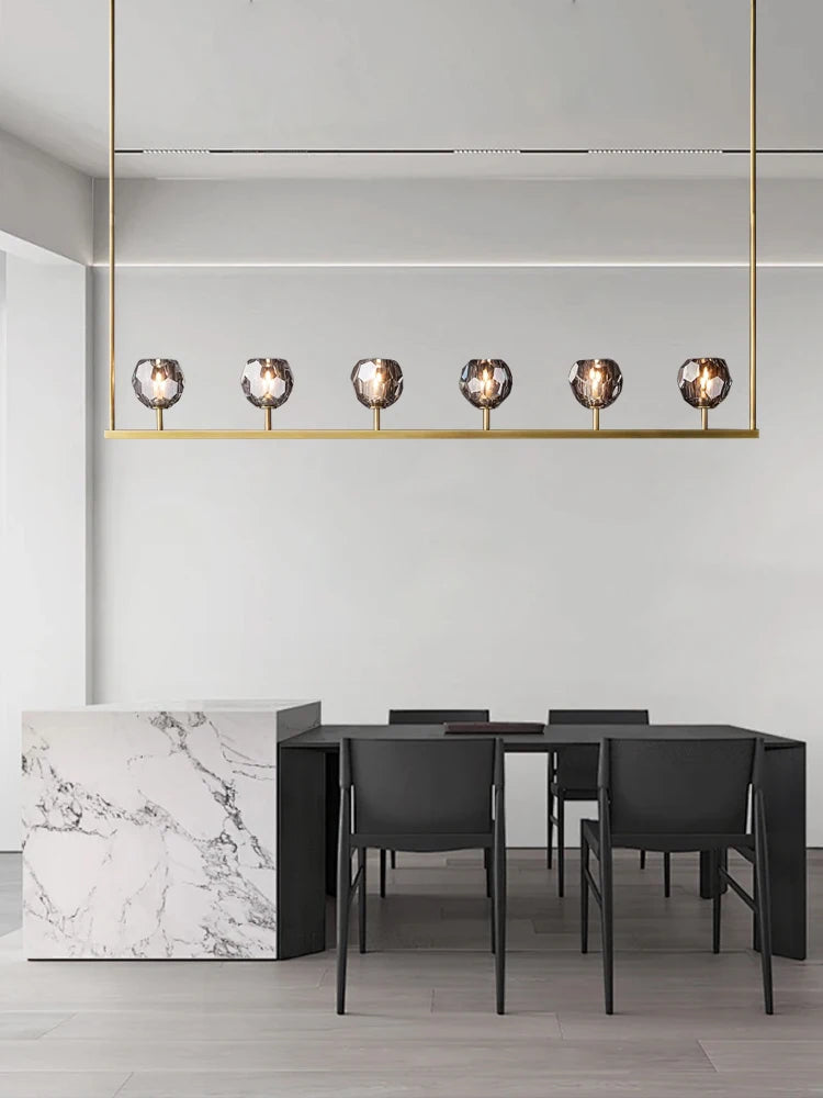 Postmodern crystal copper chandelier over dining table