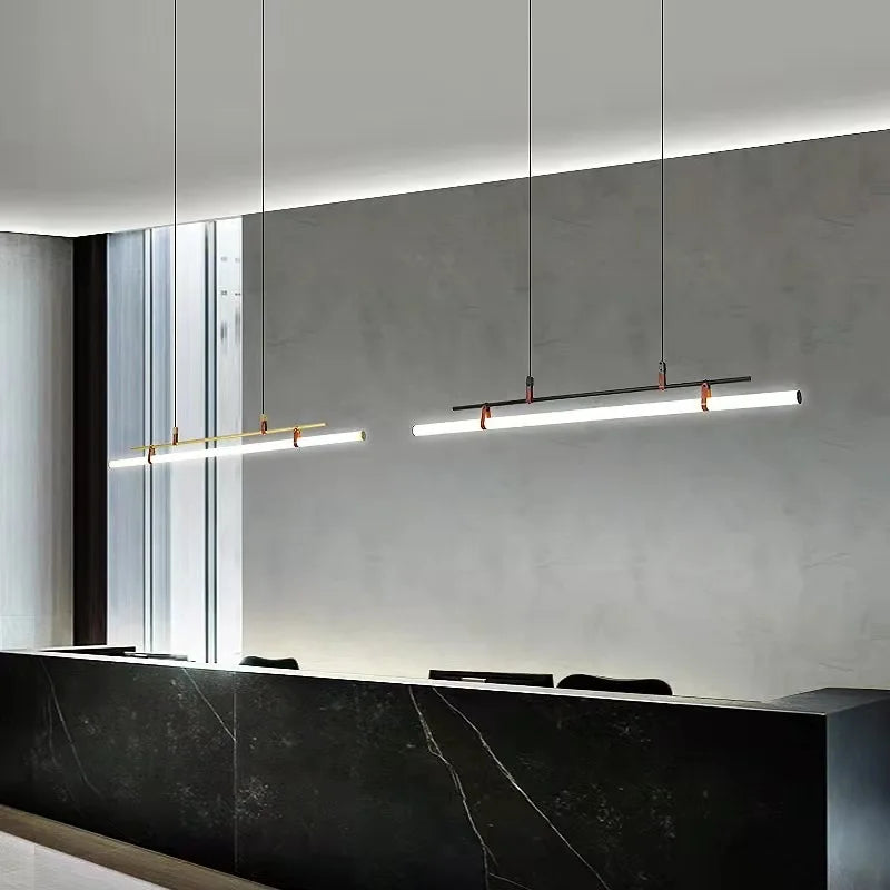 Minimalist gold tube chandelier office interior