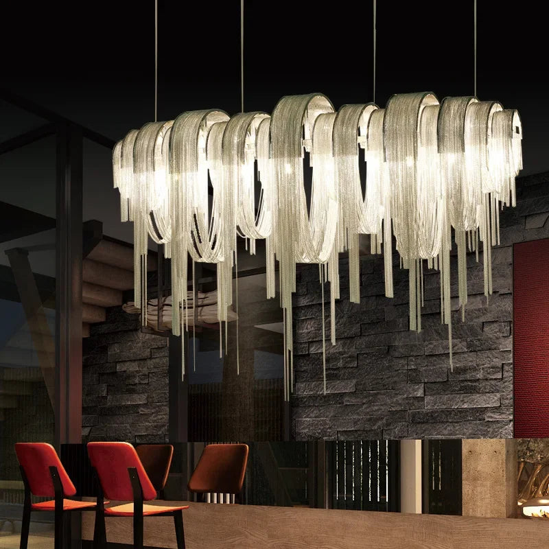Hanging elongated chandelier with shimmering layered strands