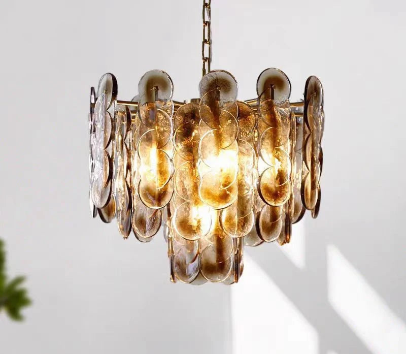 Retro amber glass chandelier with layered glass discs warm light