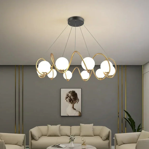 Bauhaus swirl gold chandelier with frosted globes