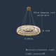 LED ring chandelier above living room seating