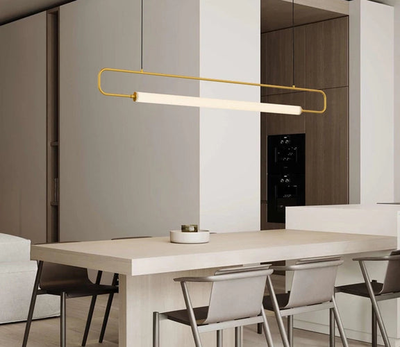 Minimalist long tube LED pendant light over dining table