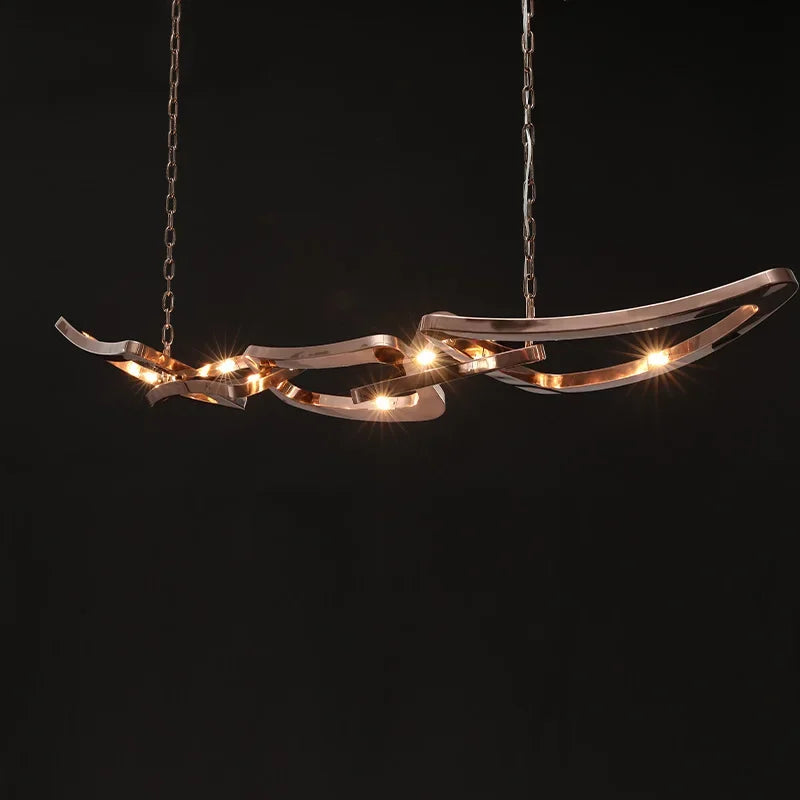 Adjustable Rose Gold Chandelier Over Kitchen Island