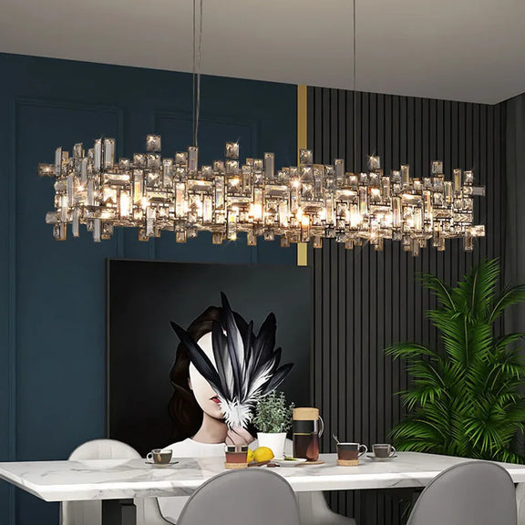 Gold geometric crystal chandelier hanging in modern living room