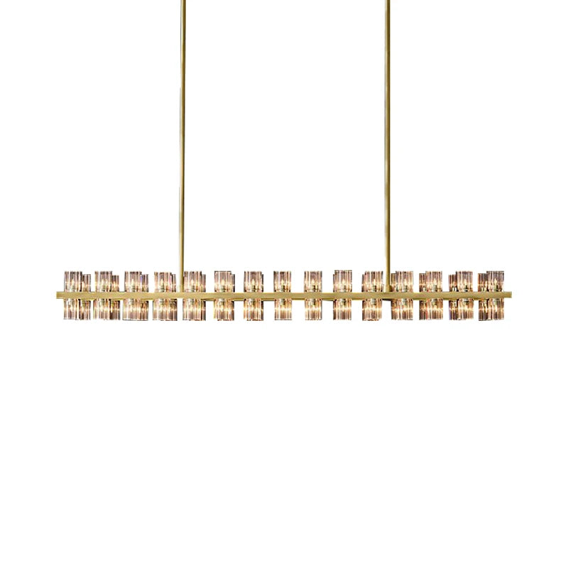 Brass and chrome crystal bar chandelier over kitchen island