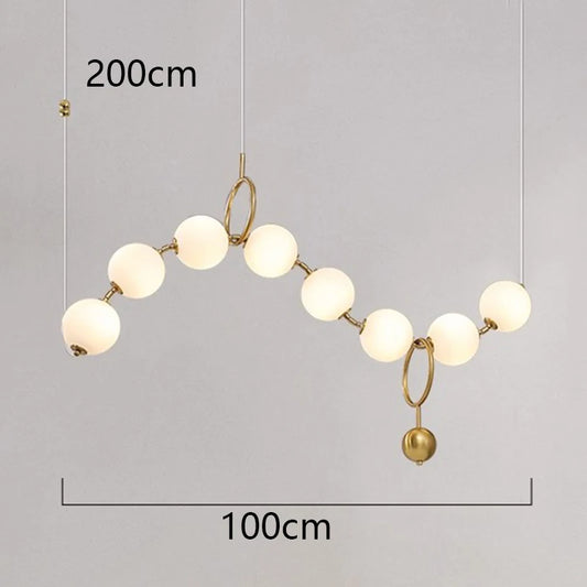 Luxury gold globe pendant light with frosted glass