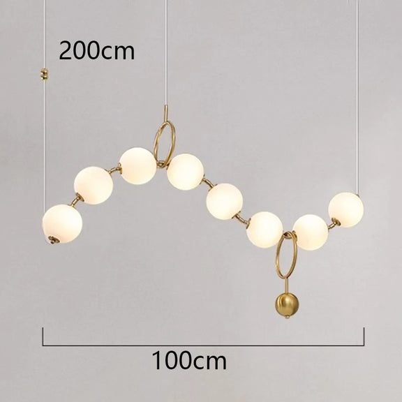 Luxury gold globe pendant light with frosted glass