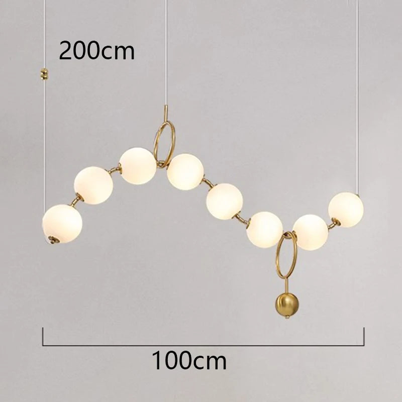 Luxury gold globe pendant light with frosted glass