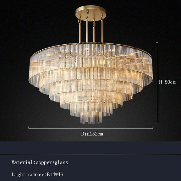 Statement gold glass chandelier hanging over living room interior