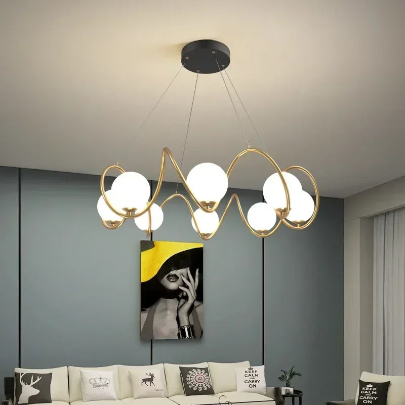 Frosted globe LED chandelier in Bauhaus style