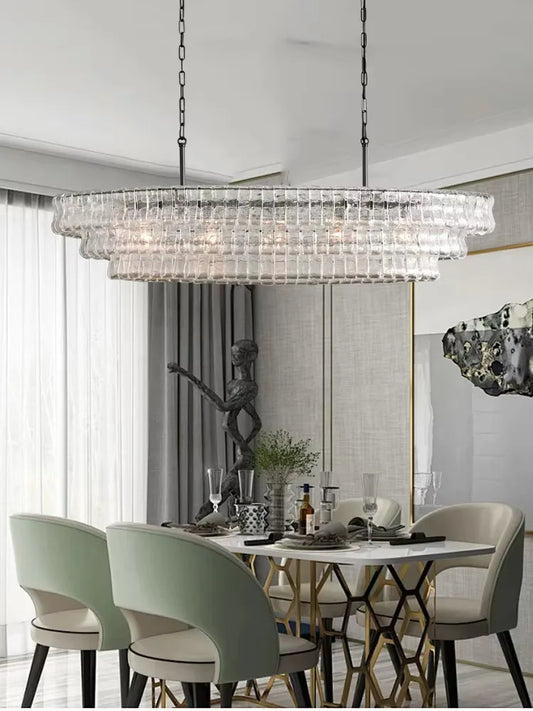 French retro oval glass chandelier over dining table
