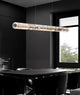 Modern modular linear LED pendant light over kitchen island