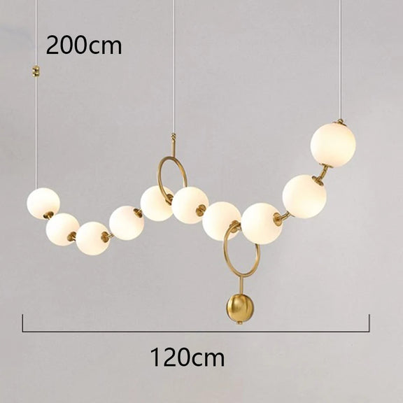 Statement gold orb pendant light for modern interiors
