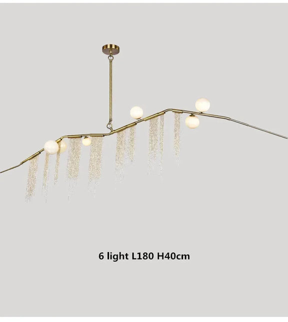 Artistic gold tassel chandelier modern interior