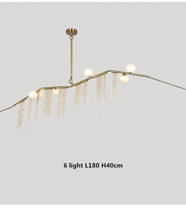 Artistic gold tassel chandelier modern interior