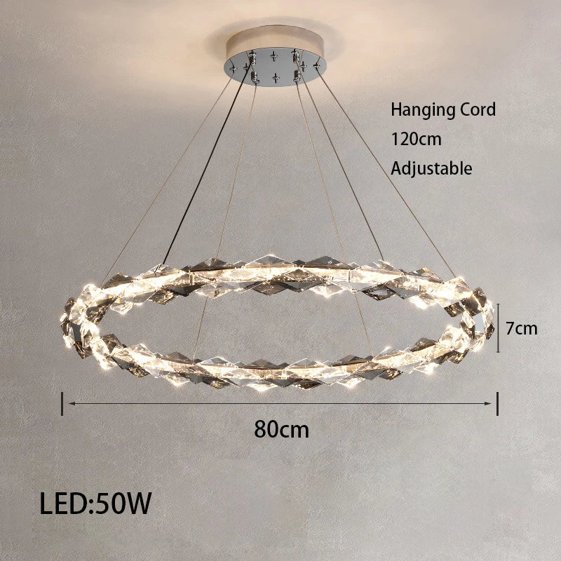 Modern circular chandelier above dining table
