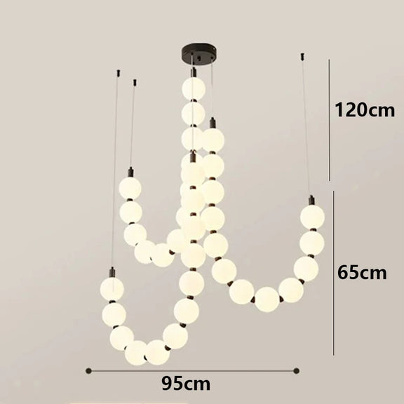 Cascading globe pendant chandelier for stairwell lighting