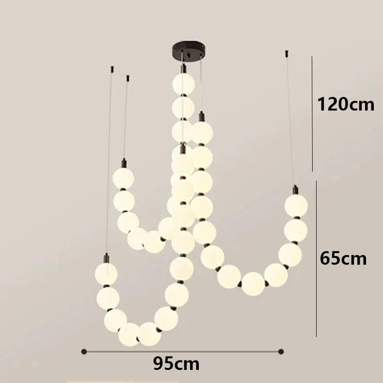 Cascading globe pendant chandelier for stairwell lighting