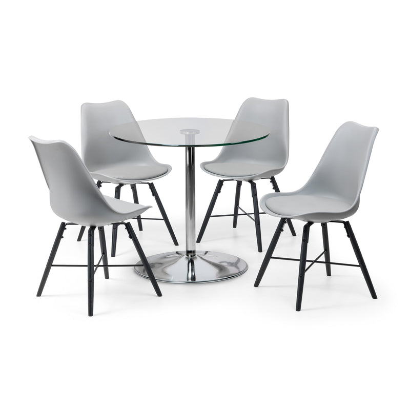 Round glass dining table with four gray chairs on a white background