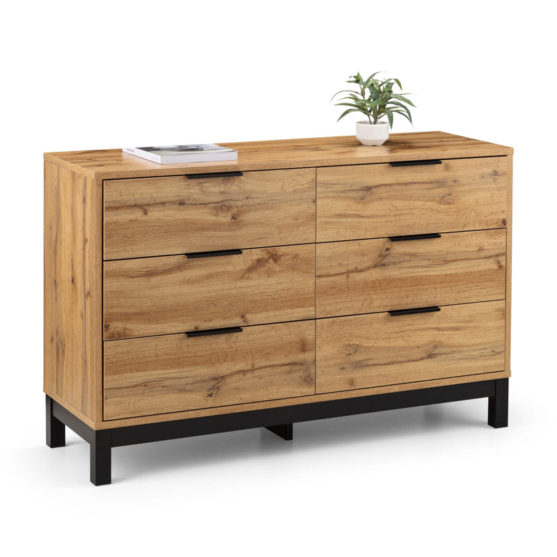 Wooden dresser with six drawers on a white background