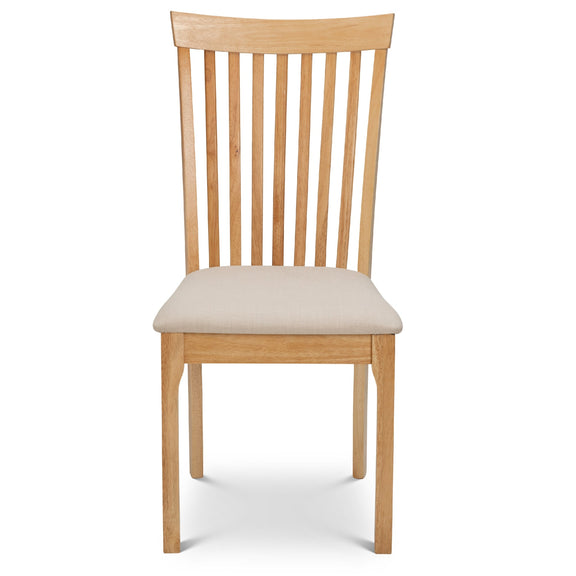 Wooden chair with a cream cushion on a white background