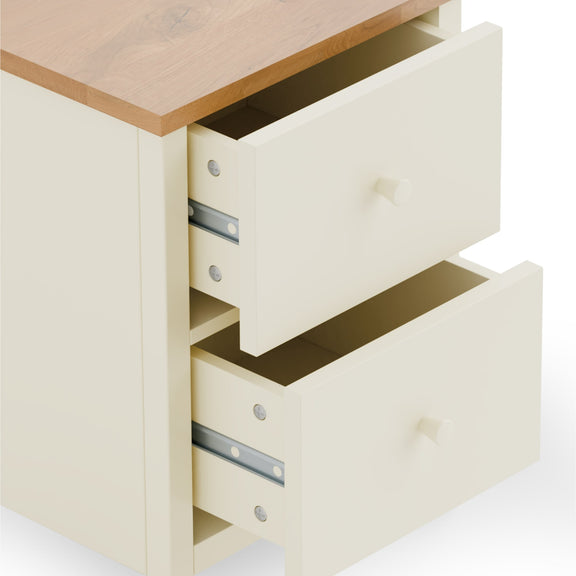 Wooden desk with open drawers on a white background
