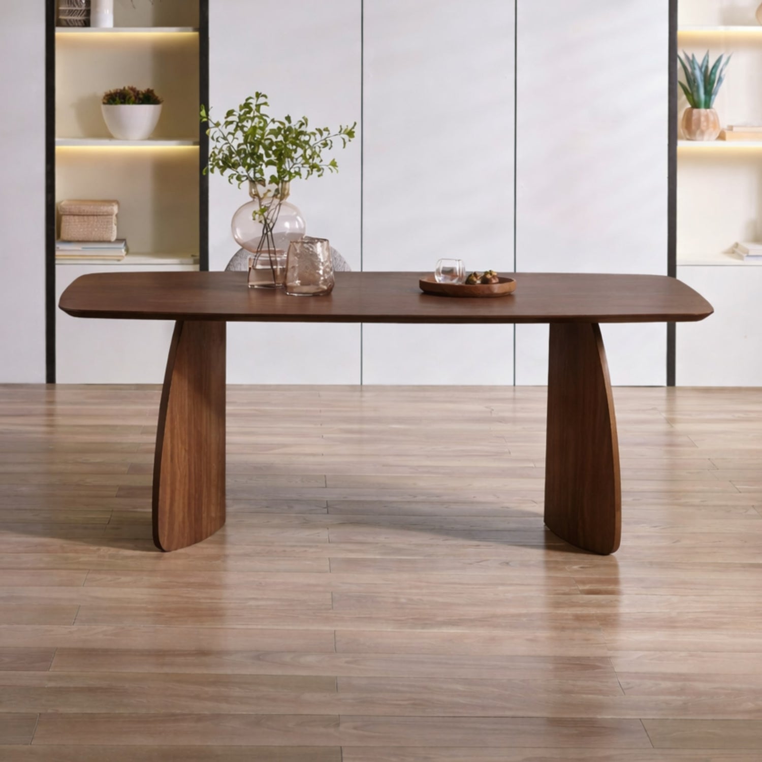 Wooden dining table with a modern design in a minimalistic room.