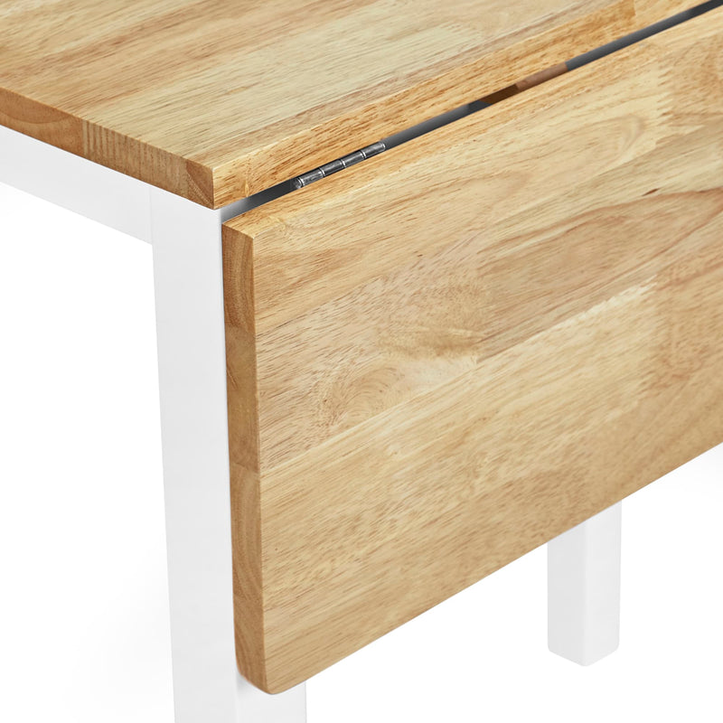 Wooden table with white legs on a white background