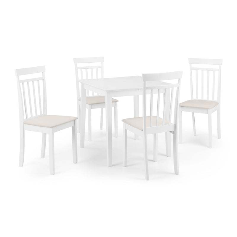 White dining table set with four chairs on a white background