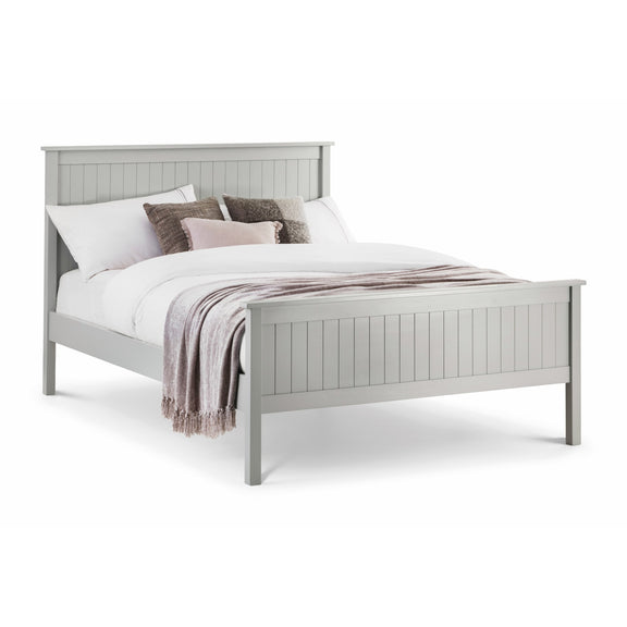 Gray wooden bed with white bedding and decorative pillows on a white background