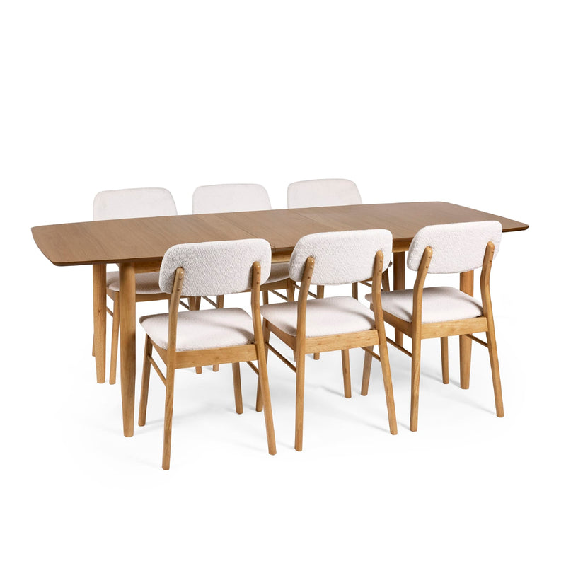 Dining table set with six chairs on a white background