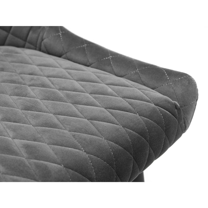 Quilted gray seat cover on a white background