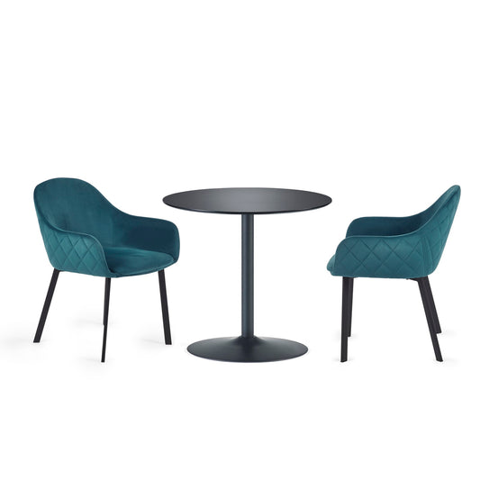 Two teal chairs with quilted design on a white background