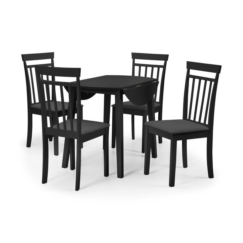 Black dining table set with four chairs on a white background